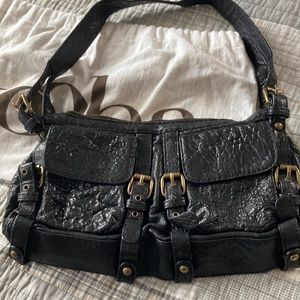 Kooba Jessie Black Pebbled Leather Buckle Shoulder Purse Bag.